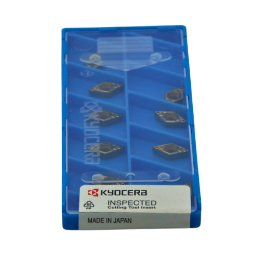 Angled view of 10 Kyocera DCMT070204HQ CA025P inserts in packaging.