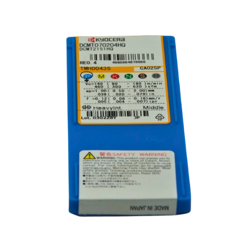 Detailed macro of the cutting edge on a Kyocera DCMT070204HQ CA025P insert.